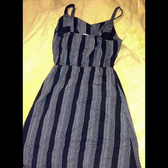 Cute black & white stripped button down style dress. Super cute for fall! - Picture 2 of 3